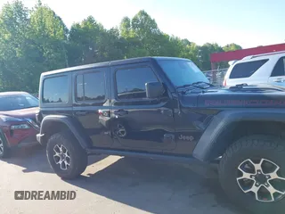 2022 Jeep Wrangler Unlimited Rubicon with VIN 1C4HJXFNXNW149063, listed as a IAAI auction lot 42130171 with 33,961 mi miles and . Bid and sale history available at DreamBid. Image 13.