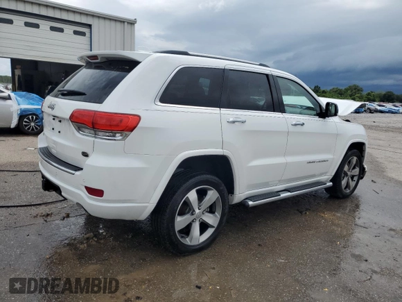 2015 Jeep Grand Cherokee Overland with VIN 1C4RJFCGXFC891616, listed as a Copart auction lot 61386065 with 90,011 mi miles and Salvage title. Bid and sale history available at DreamBid. Image 3.