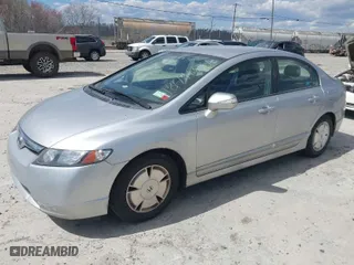 2007 Honda Civic Hybrid with VIN JHMFA36297S019581, listed as a IAAI auction lot 41879187 with 87,297 mi miles. Bid and sale history available at carsss.com. Image 2.