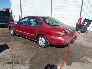 1997 Ford Taurus GL z VIN 1FALP52U2VA207986, wystawiony jako IAAI lot #41606014 z przebiegiem 225 124 mil mil oraz . Historia ofert i sprzedaży dostępna na DreamBid. Obrazek 3.
