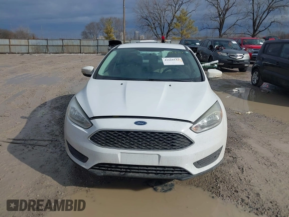2016 Ford Focus SE z VIN 1FADP3F23GL343651, wystawiony jako IAAI lot #41668112 z przebiegiem 120 891 mil mil oraz . Historia ofert i sprzedaży dostępna na DreamBid. Obrazek 13.