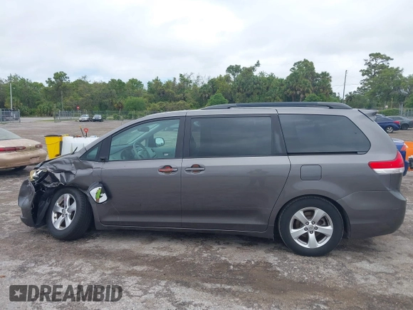 2014 Toyota Sienna LE AAS with VIN 5TDKK3DC9ES448461, listed as a IAAI auction lot 41986724 with 102,930 mi miles and . Bid and sale history available at carsss.com. Image 14.