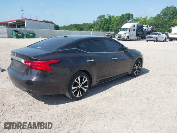 2016 Nissan Maxima Platinum with VIN 1N4AA6AP7GC375057, listed as a IAAI auction lot 42243081 with 175,379 mi miles and . Bid and sale history available at DreamBid. Image 4.