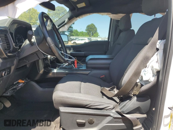 2021 Ford F-150 XL with VIN 1FTFW1E59MFD09567, listed as a Copart auction lot 52706195 with 104,716 mi miles and Salvage Title. Bid and sale history available at carsss.com. Image 7.