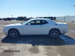 2011 Dodge Challenger z VIN 2B3CJ4DG5BH602787, wystawiony jako IAAI lot #41759684 z przebiegiem 128 055 mil mil oraz . Historia ofert i sprzedaży dostępna na DreamBid. Obrazek 14.