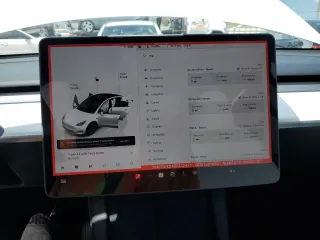 2025 Tesla Model Y Long Range with VIN 7SAYGDED4SF232433, listed as a Copart auction lot 51504015 with Not Provided miles and Salvage Title. Bid and sale history available at DreamBid. Image 9.