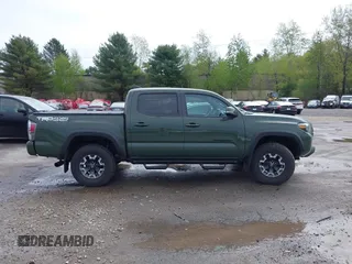 2021 Toyota Tacoma SR with VIN 3TMCZ5AN5MM380286, listed as a IAAI auction lot 42165523 with 58,965 mi miles and . Bid and sale history available at DreamBid. Image 13.