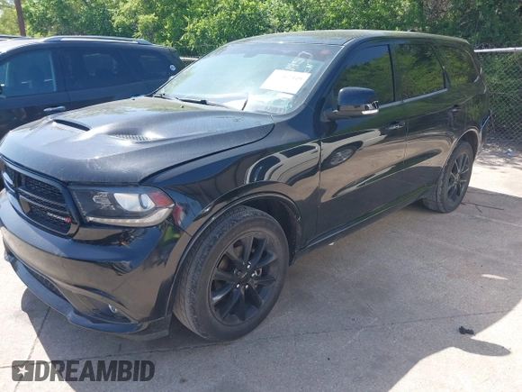 2018 Dodge Durango GT with VIN 1C4RDHDG9JC329457, listed as a IAAI auction lot 41967349 with 127,161 mi miles and . Bid and sale history available at DreamBid. Image 2.