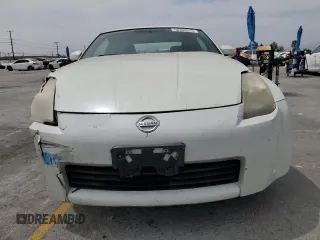 2004 Nissan 350Z Touring with VIN JN1AZ34D74T160909, listed as a Copart auction lot 58302075 with 54,100 mi miles and Salvage title. Bid and sale history available at DreamBid. Image 5.