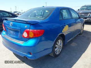2009 Toyota Corolla with VIN 1NXBU40E49Z022648, listed as a IAAI auction lot 42042633 with 134,628 mi miles. Bid and sale history available at carsss.com. Image 4.
