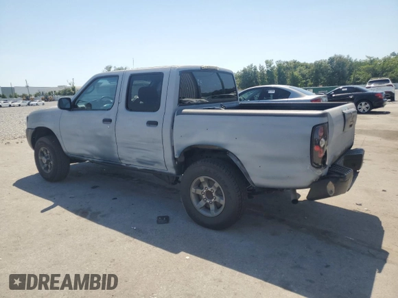 2003 Nissan Frontier XE with VIN 1N6ED27T23C456197, listed as a Copart auction lot 57393515 with 181,596 mi miles and Salvage title. Bid and sale history available at DreamBid. Image 2.