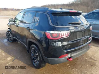 2019 Jeep Compass Trailhawk with VIN 3C4NJDDBXKT671364, listed as a IAAI auction lot 41655974 with 104,252 mi miles and . Bid and sale history available at carsss.com. Image 3.