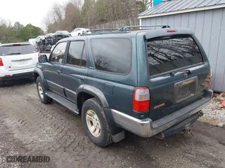 1997 Toyota 4Runner Limited with VIN JT3HN87R1V0078046, listed as a IAAI auction lot 42030550 with 163,683 mi miles. Bid and sale history available at carsss.com. Image 3.