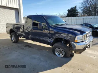 2001 Ford Super Duty F-250 XL with VIN 1FTNX20F11EB60992, listed as a Copart auction lot 88501795 with 136,557 mi miles and Salvage Title. Bid and sale history available at carsss.com. Image 4.
