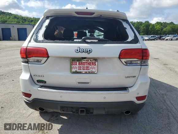 2014 Jeep Grand Cherokee Limited with VIN 1C4RJFBGXEC325357, listed as a Copart auction lot 61993715 with 156,718 mi miles and Salvage title. Bid and sale history available at DreamBid. Image 6.