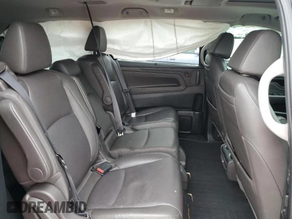 2018 Honda Odyssey Elite с VIN 5FNRL6H94JB007489, выставлен на аукционе Copart как лот 57077855 с пробегом 106 402 миль миль и Списание • Salvage title. История ставок и продаж доступна на DreamBid. Изображение 11.