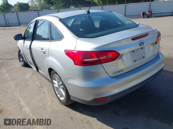 2016 Ford Focus SE with VIN 1FADP3F24GL230601, listed as a IAAI auction lot 41988130 with 176,366 mi miles. Bid and sale history available at carsss.com. Image 3.