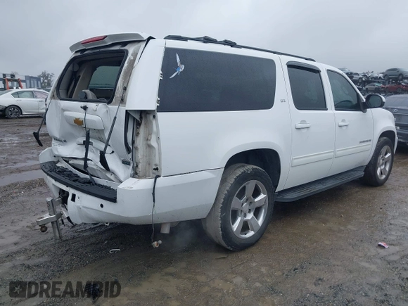 2014 Chevrolet Suburban LT with VIN 1GNSCJE06ER154639, listed as a IAAI auction lot 41410623 with 213,592 mi miles. Bid and sale history available at carsss.com. Image 4.