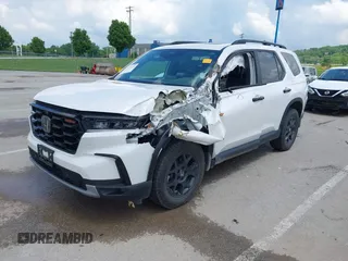 2024 Honda Pilot TrailSport z VIN 5FNYG1H6XRB004763, wystawiony jako IAAI lot #42237606 z przebiegiem 14 819 mil mil oraz . Historia ofert i sprzedaży dostępna na DreamBid. Obrazek 18.