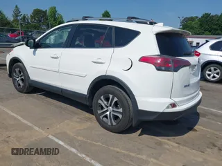 2017 Toyota RAV4 LE with VIN JTMBFREV8HJ157555, listed as a IAAI auction lot 42147300 with 81,187 mi miles and . Bid and sale history available at DreamBid. Image 3.