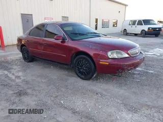 2005 Mercury Sable GS with VIN 1MEFM50U55A600253, listed as a IAAI auction lot 41616733 with 141,936 mi miles. Bid and sale history available at carsss.com. Image 1.