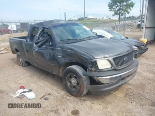 2002 Ford F-150 XL with VIN 1FTRX17W72NA87338, listed as a IAAI auction lot 42583398 with Not provided miles and . Bid and sale history available at DreamBid. Image 1.
