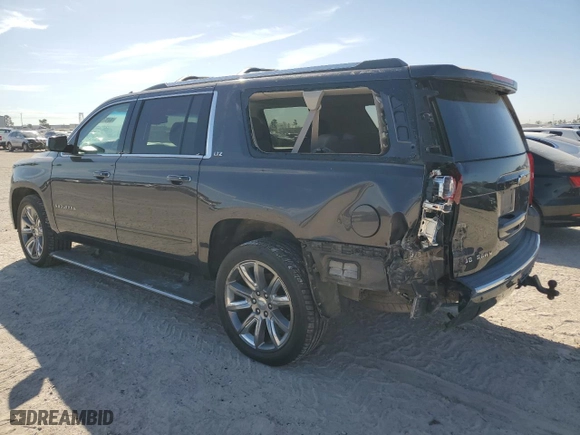 2015 Chevrolet Suburban LTZ with VIN 1GNSKKKC3FR551752, listed as a Copart auction lot 47878375 with 140,330 mi miles and Salvage Title. Bid and sale history available at carsss.com. Image 2.
