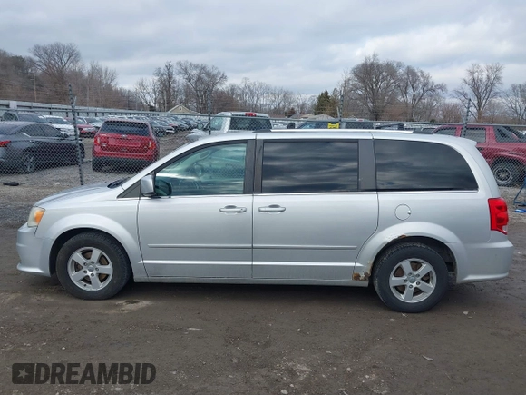 2011 Dodge Grand Caravan Crew with VIN 2D4RN5DG0BR751611, listed as a IAAI auction lot 41683889 with 181,551 mi miles and . Bid and sale history available at DreamBid. Image 14.