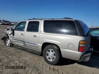 2004 GMC Yukon XL SLT with VIN 1GKEC16T44J308569, listed as a Copart auction lot 71376884 with 0 mi miles and Salvage Title. Bid and sale history available at carsss.com. Image 2.