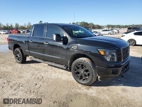 2019 Nissan Titan XD SL with VIN 1N6BA1F41KN529918, listed as a Copart auction lot 85999634 with 91,086 mi miles and Salvage Title. Bid and sale history available at carsss.com. Image 4.