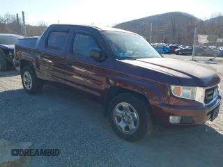 2011 Honda Ridgeline RT with VIN 5FPYK1F2XBB002135, listed as a IAAI auction lot 41734058 with 134,210 mi miles. Bid and sale history available at carsss.com. Image 1.