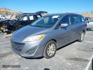 2014 Mazda Mazda5 Sport with VIN JM1CW2BL8E0177448, listed as a IAAI auction lot 41616354 with 202,908 mi miles. Bid and sale history available at carsss.com. Image 2.
