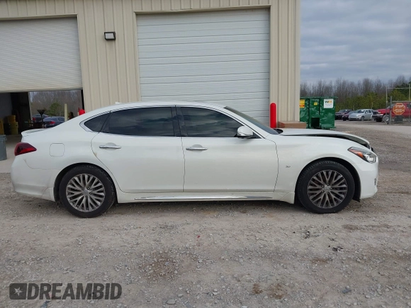 2015 Infiniti Q70 with VIN JN1BY1PP5FM601628, listed as a IAAI auction lot 41510075 with 102,363 mi miles and . Bid and sale history available at DreamBid. Image 13.
