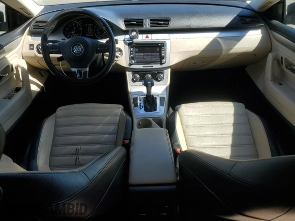 2010 Volkswagen CC Sport with VIN WVWMP7AN7AE552728, listed as a Copart auction lot 50273095 with 212,397 mi miles and Salvage Title. Bid and sale history available at carsss.com. Image 8.
