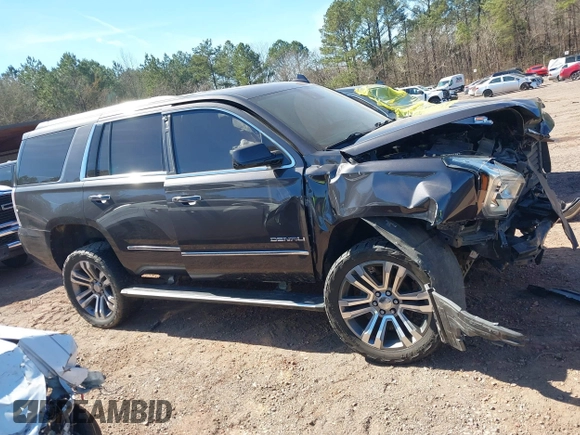 2018 GMC Yukon Denali with VIN 1GKS2CKJ6JR303263, listed as a IAAI auction lot 41633514 with 130,990 mi miles. Bid and sale history available at carsss.com. Image 12.