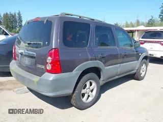 2006 Mazda Tribute i with VIN 4F2YZ02Z16KM00215, listed as a IAAI auction lot 42153919 with 272,828 mi miles and . Bid and sale history available at carsss.com. Image 4.