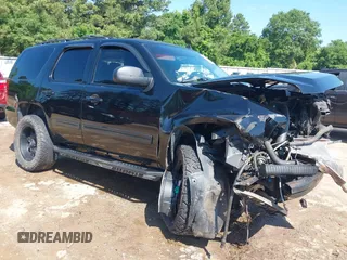 2013 Chevrolet Tahoe LS with VIN 1GNSCAE06DR263469, listed as a IAAI auction lot 42245636 with 240,506 mi miles and . Bid and sale history available at DreamBid. Image 1.
