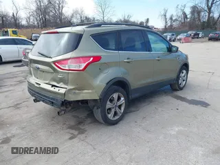 2013 Ford Escape SE with VIN 1FMCU9GX1DUB69236, listed as a IAAI auction lot 41575494 with 122,075 mi miles and . Bid and sale history available at DreamBid. Image 4.
