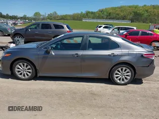 2019 Toyota Camry LE with VIN 4T1B11HK8KU289721, listed as a IAAI auction lot 42021107 with 69,828 mi miles and . Bid and sale history available at DreamBid. Image 14.