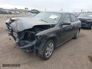 2009 Kia Optima LX with VIN KNAGE228X95299444, listed as a IAAI auction lot 41953241 with 201,170 mi miles. Bid and sale history available at carsss.com. Image 6.