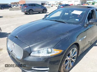 2015 Jaguar XJ R-Sport with VIN SAJWJ1CD6F8V83990, listed as a IAAI auction lot 41936162 with Not Provided miles and . Bid and sale history available at DreamBid. Image 6.