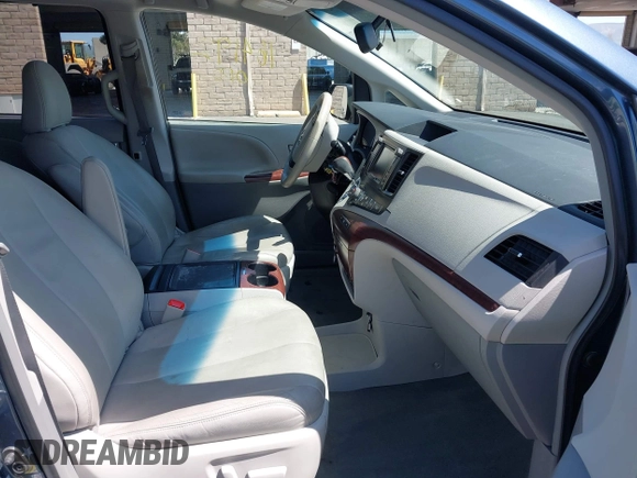 2014 Toyota Sienna XLE with VIN 5TDYK3DC5ES447155, listed as a IAAI auction lot 42003951 with 60,064 mi miles and . Bid and sale history available at DreamBid. Image 5.