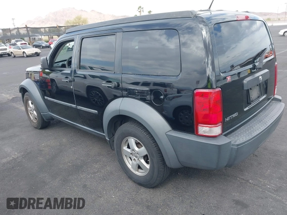 2007 Dodge Nitro SXT with VIN 1D8GT28K27W502900, listed as a IAAI auction lot 42077428 with 166,114 mi miles. Bid and sale history available at carsss.com. Image 3.