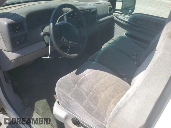 2000 Ford F-250 XL with VIN 1FTNF21F0YEC85459, listed as a Copart auction lot 63040505 with 328,049 mi miles and Salvage title. Bid and sale history available at DreamBid. Image 8.