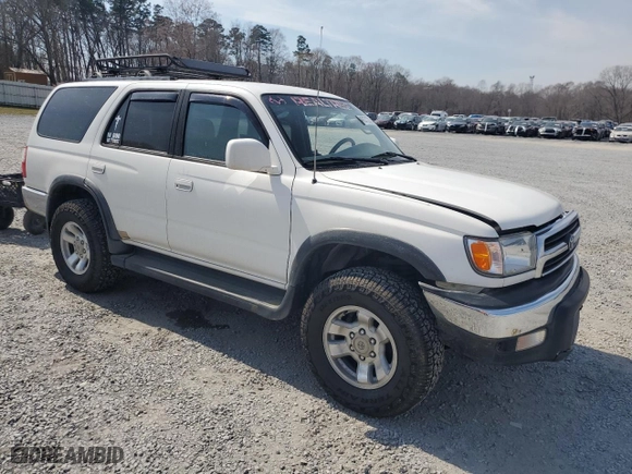 2000 Toyota 4Runner SR5 with VIN JT3HN86R5Y0286565, listed as a Copart auction lot 49271215 with 230,509 mi miles and Salvage Title. Bid and sale history available at carsss.com. Image 4.