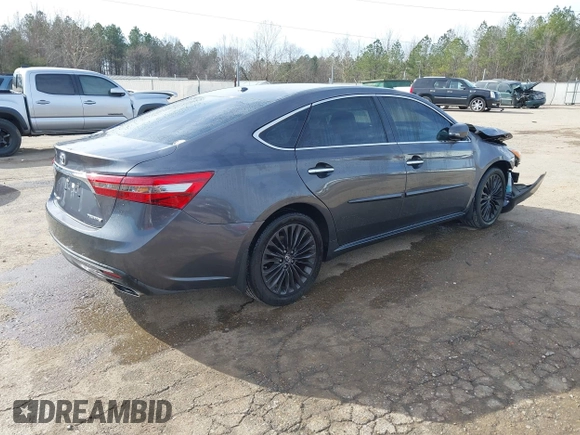 2016 Toyota Avalon Limited with VIN 4T1BK1EB5GU205833, listed as a IAAI auction lot 41352698 with 152,809 mi miles. Bid and sale history available at carsss.com. Image 4.