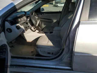 2012 Chevrolet Impala LTZ with VIN 2G1WC5E32C1171240, listed as a Copart auction lot 84490854 with 193,799 mi miles and Salvage Title. Bid and sale history available at DreamBid. Image 7.