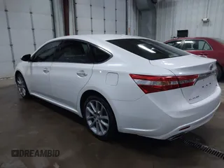 2014 Toyota Avalon Limited with VIN 4T1BK1EB6EU100635, listed as a IAAI auction lot 41609581 with 128,609 mi miles. Bid and sale history available at carsss.com. Image 3.