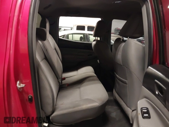 2015 Toyota Tacoma with VIN 3TMLU4EN3FM196518, listed as a IAAI auction lot 41198481 with 96,277 mi miles and . Bid and sale history available at DreamBid. Image 8.