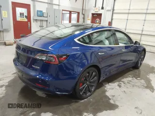 2020 Tesla Model 3 Performance z VIN 5YJ3E1EC7LF641885, wystawiony jako IAAI lot #41372794 z przebiegiem Nie podano mil oraz . Historia ofert i sprzedaży dostępna na DreamBid. Obrazek 4.